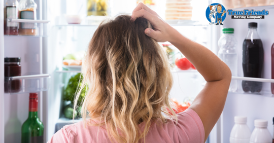 A women open her fridge