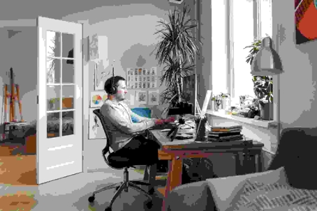 man working from home at desk