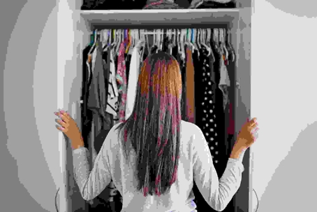 woman looking into closet
